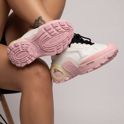 White and pink Adidas chunky platform sneaker with sculpted adiPRENE+ sole and black tongue
