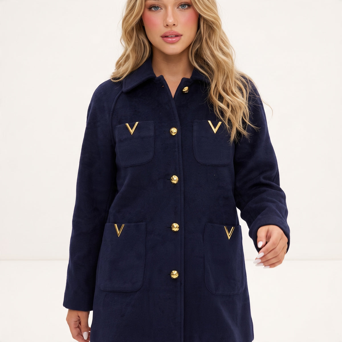 navy women's wool jacket with gold V hardware and gold buttons