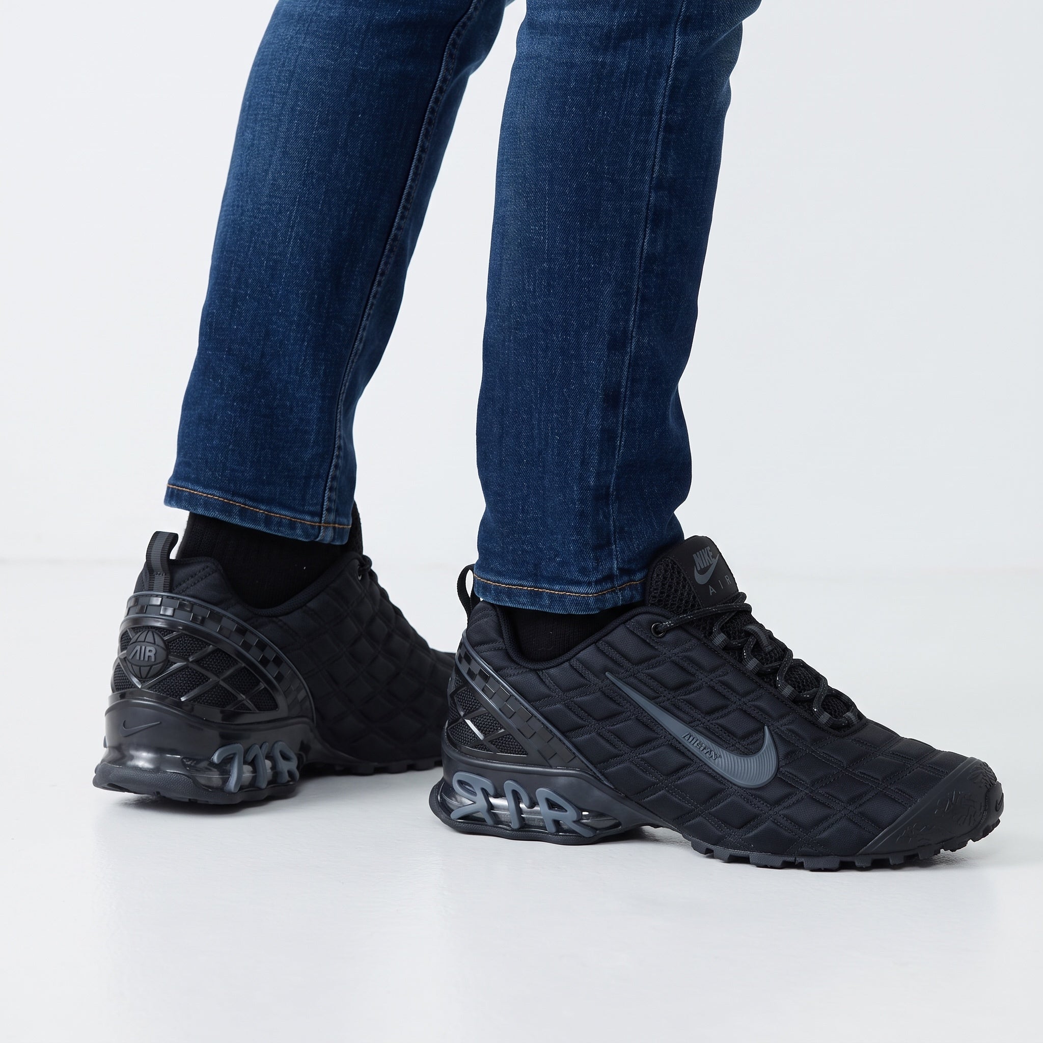 black Nike Air Max Tuned sneakers with quilted upper and visible AIR midsole