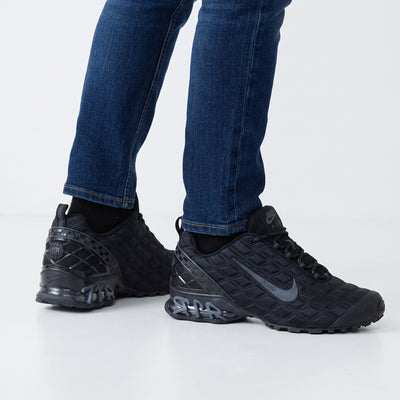 black Nike Air Max Tuned sneakers with quilted upper and visible AIR midsole