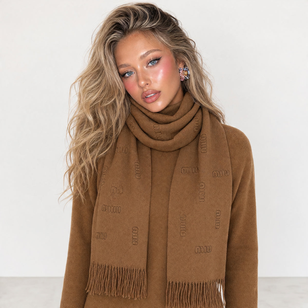 brown Miu Miu knit scarf with tonal logo and fringed ends