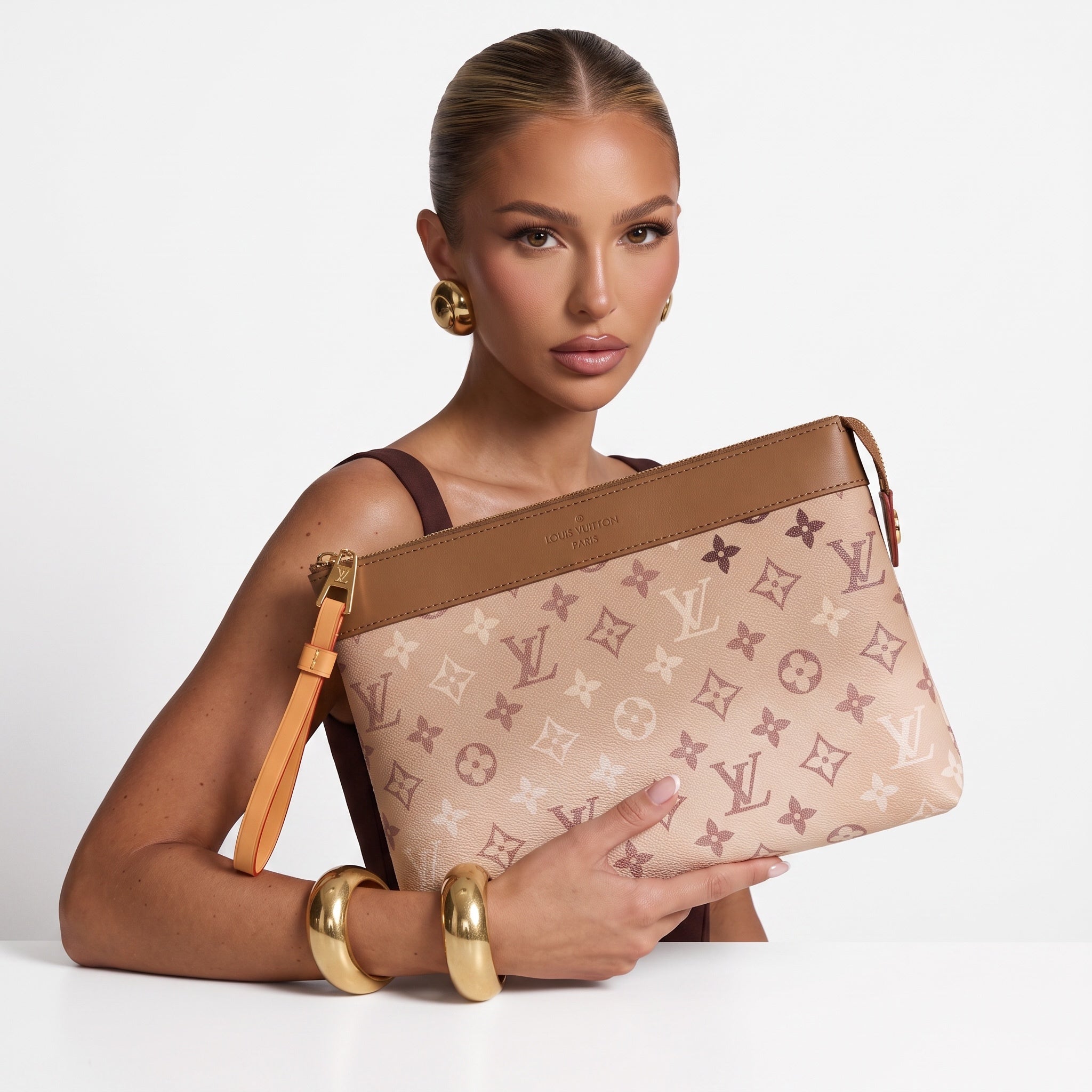 Louis Vuitton beige monogram zipper pouch with tan trim and wrist strap