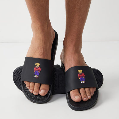 black Polo Ralph Lauren slides with small teddy bear motif on strap