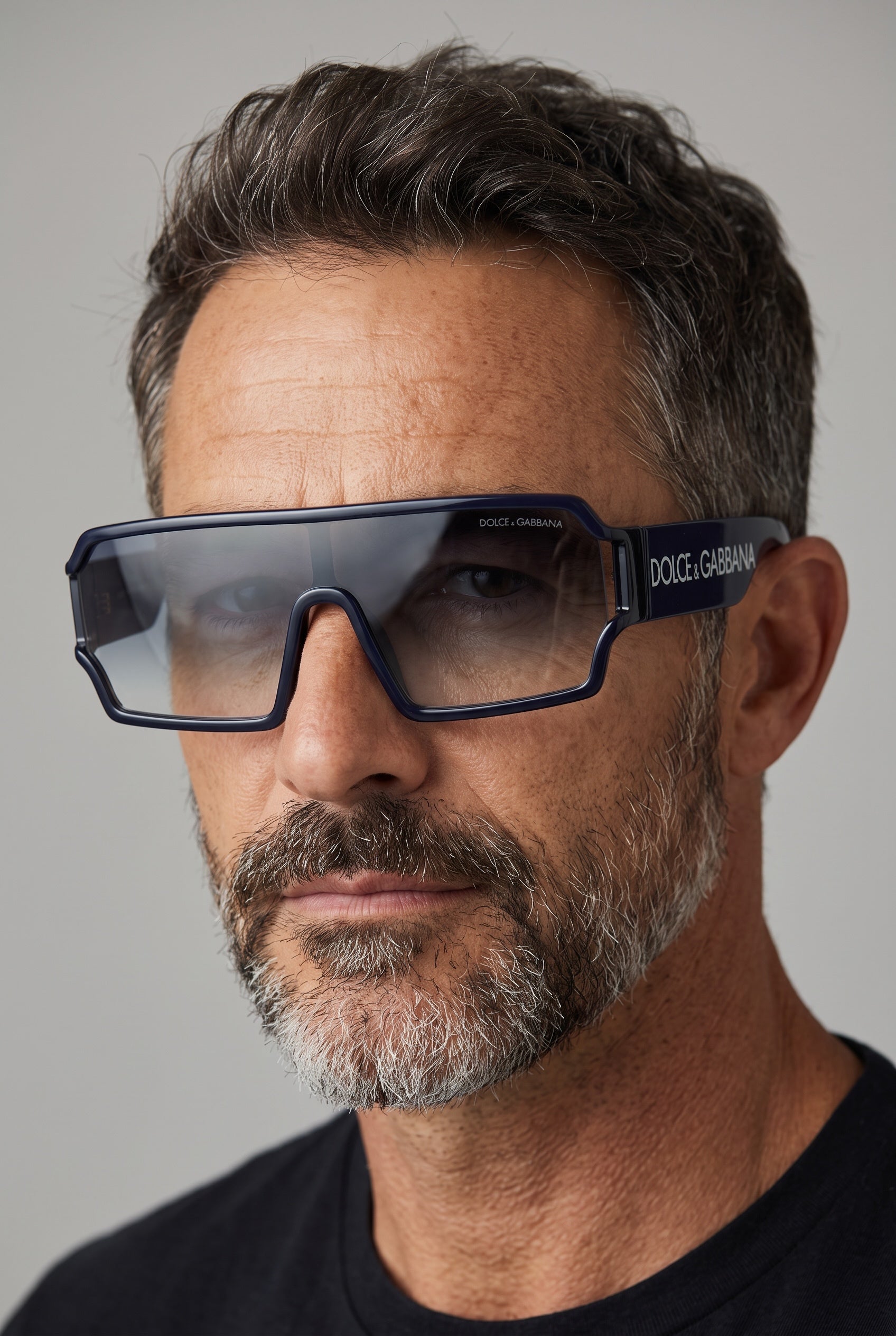 Dolce & Gabbana navy shield sunglasses with gradient lens and logo on temple