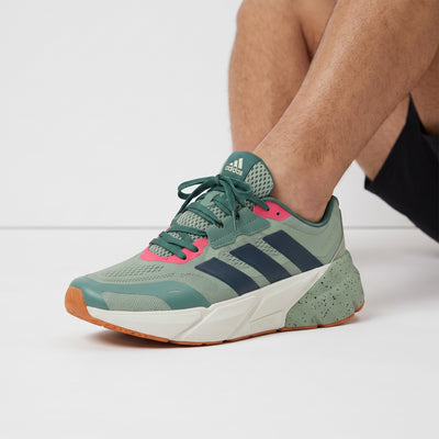 Adidas chunky runner sneaker in sage green with teal and navy accents
