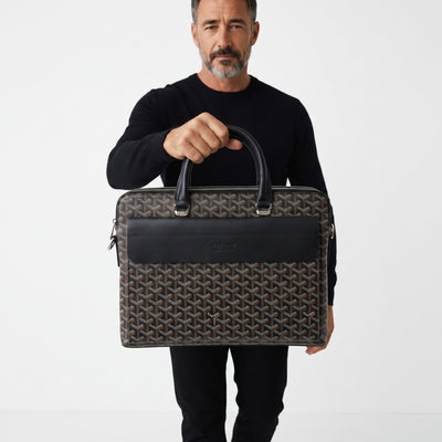 Goyard brown patterned briefcase with black leather front pocket and top handles