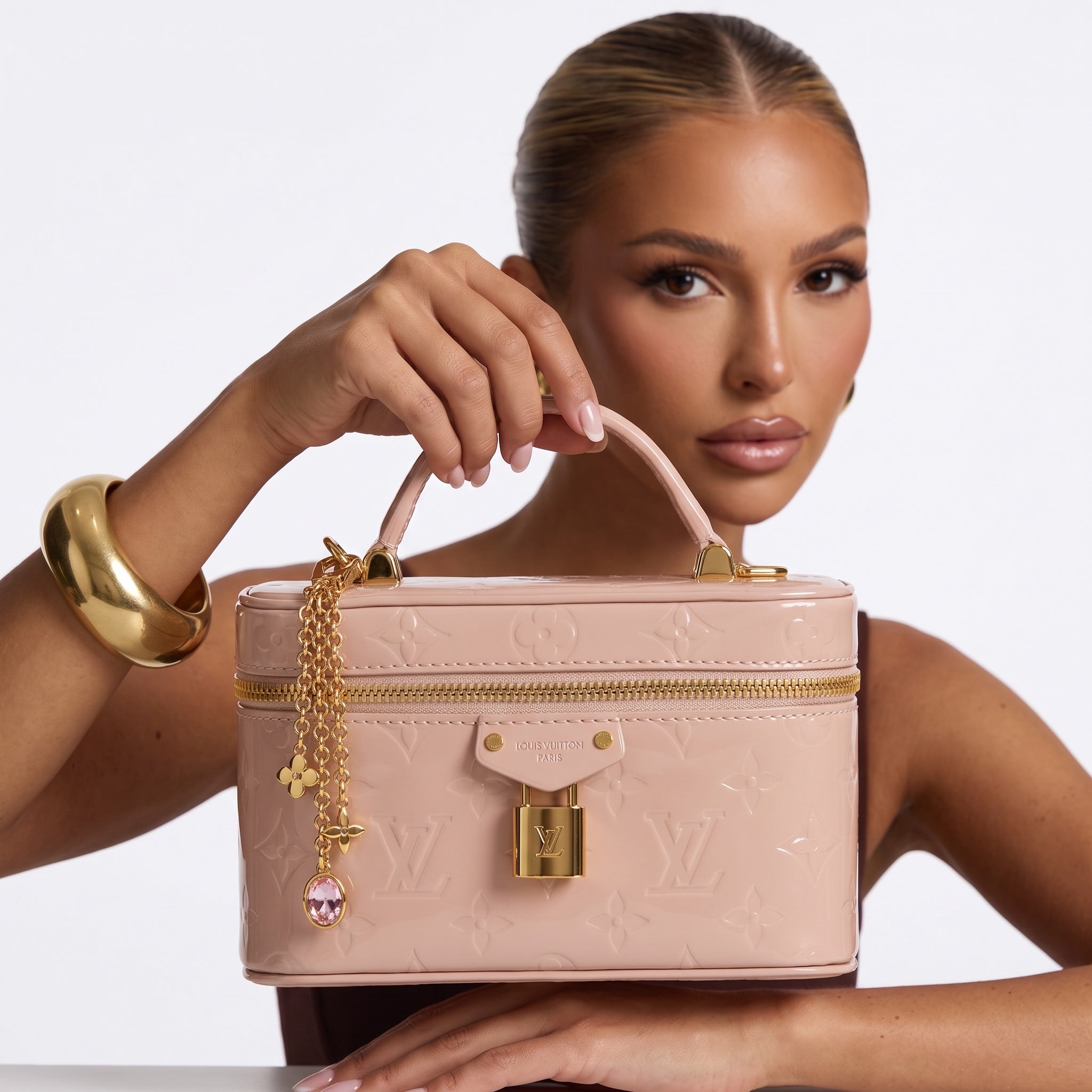 Louis Vuitton pale pink patent monogram vanity bag with top handle and gold lock