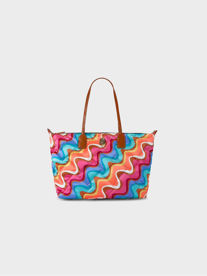 colorful quilted tote bag with brown handles and swirl print