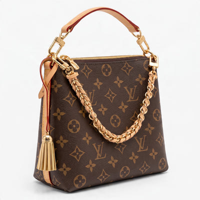 Louis Vuitton brown monogram shoulder bag with gold chain and tassel