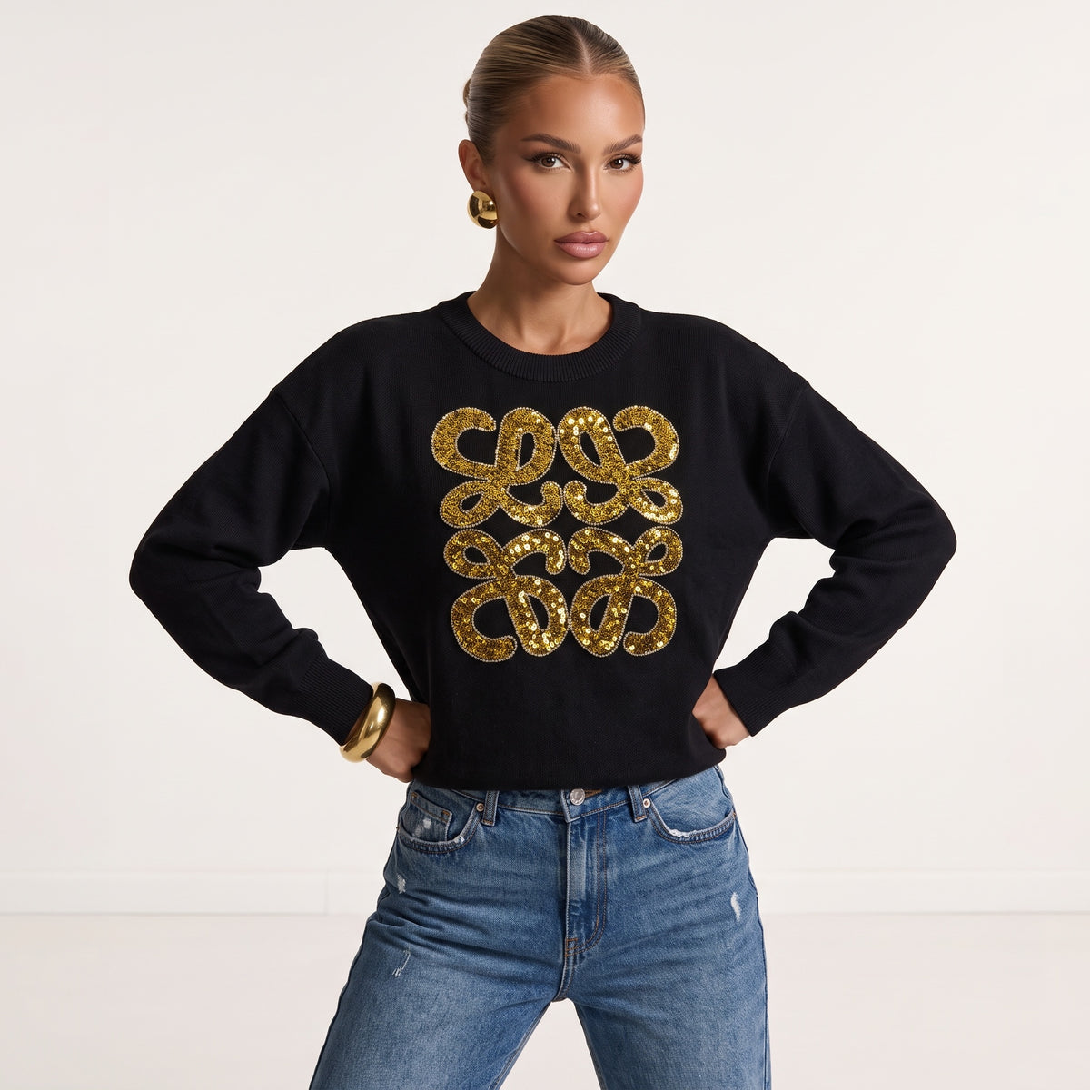 Black Loewe crew-neck sweater with gold sequin anagram motif