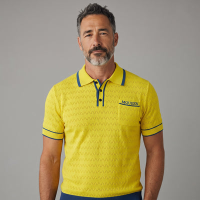 Yellow Alexander McQueen knit polo with blue trim and chest pocket