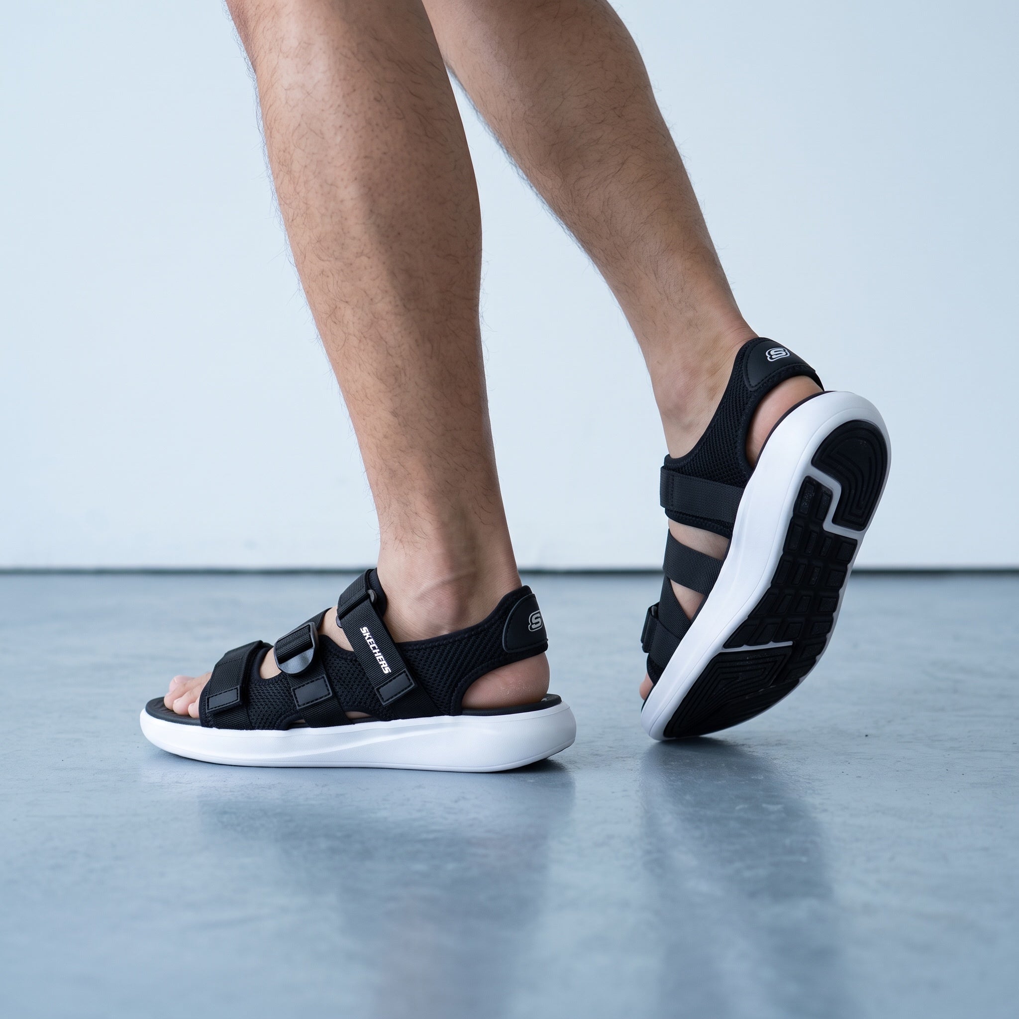 Black Skechers men's sport strap sandals with white sole