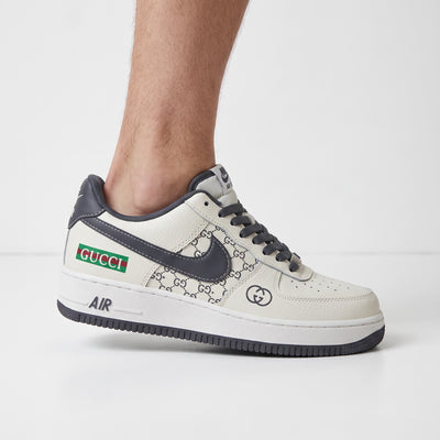 Gucci Air Force 1 low-top sneaker with GG monogram print and dark grey swoosh