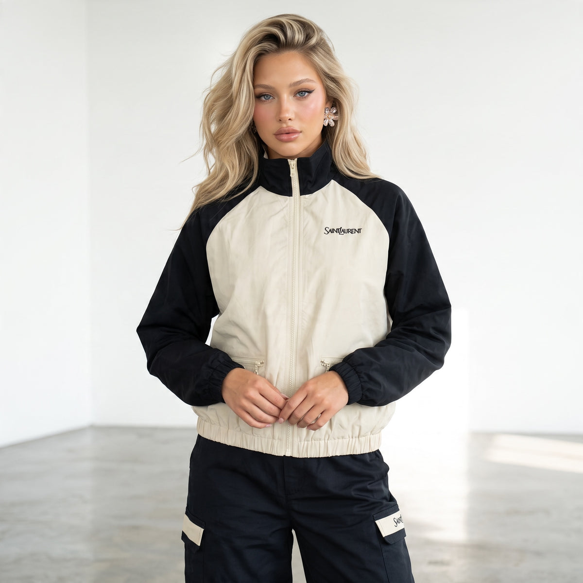 Saint Laurent beige and navy track jacket with cargo trousers laid flat and on model