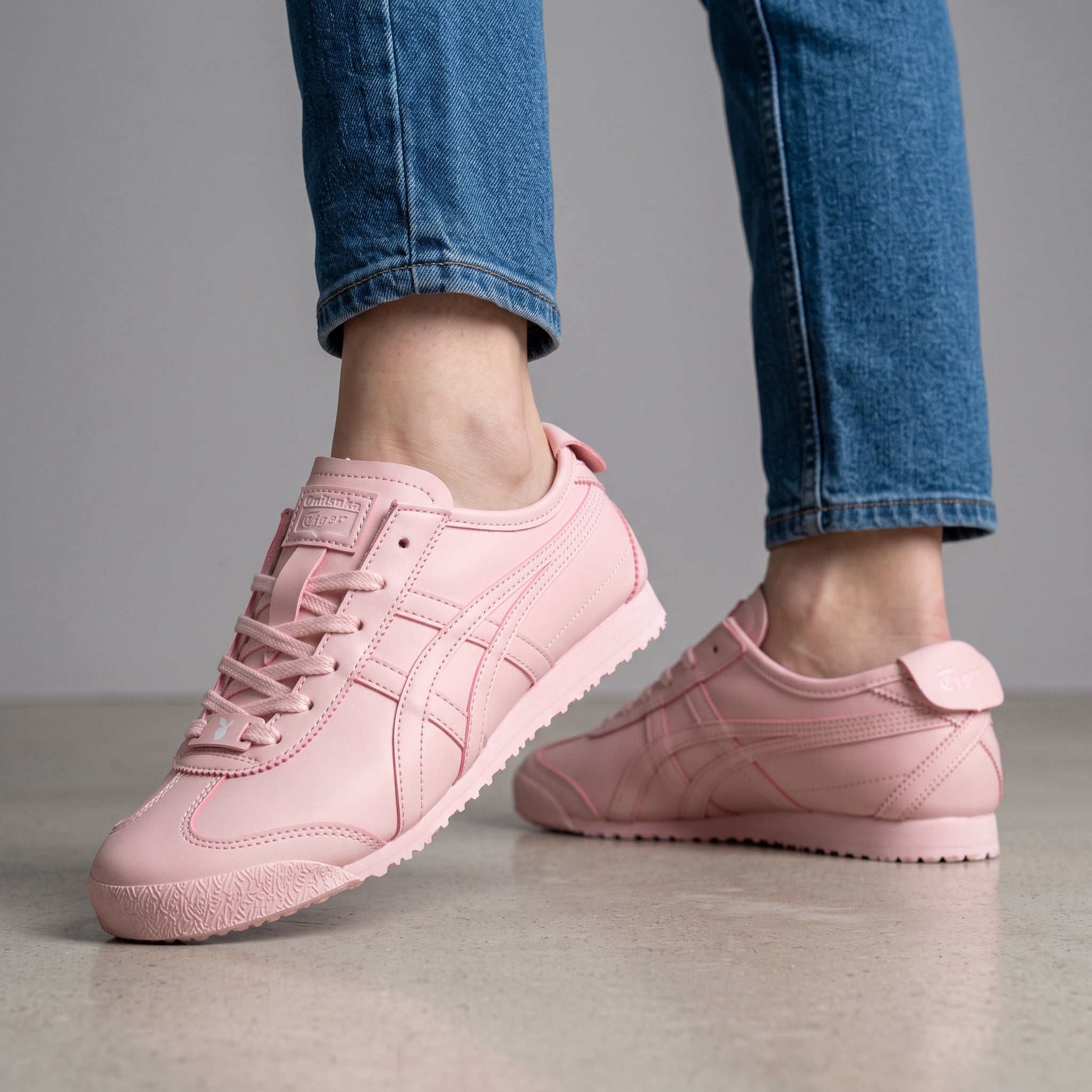 Onitsuka Tiger pastel pink low-top sneakers with tonal finish and textured sole