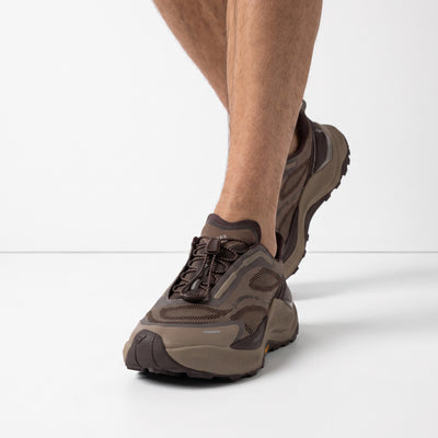 adidas brown trail sneaker with chunky lug sole and quick-lace toggle