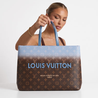 Louis Vuitton monogram tote with blue-to-brown gradient and blue logo letters