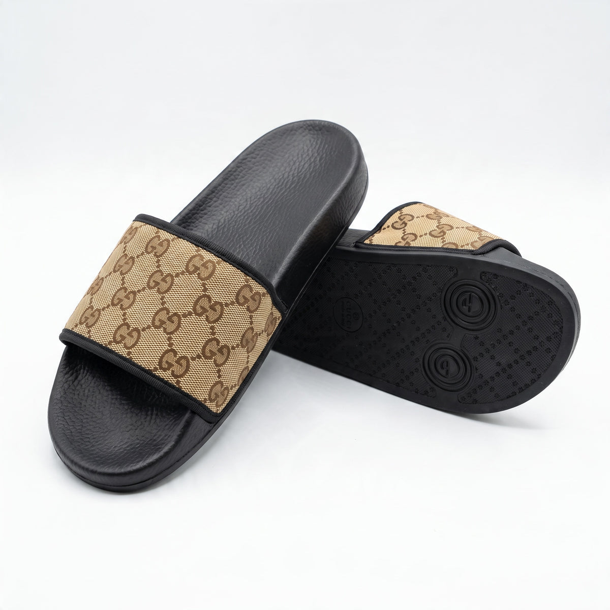 Gucci beige brown GG monogram slide with black footbed and rubber sole
