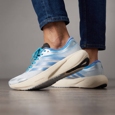 adidas pale blue and cream Dreamstrike+ sneaker side view