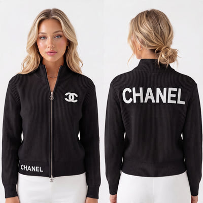 Black Chanel ribbed zip cardigan with white CC logo on chest and CHANEL lettering on back