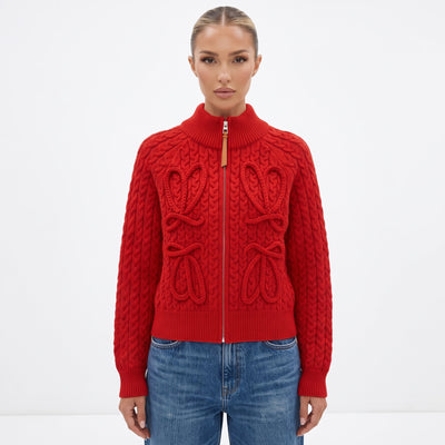 Red cable-knit zip cardigan with leather zipper pull and ribbed collar