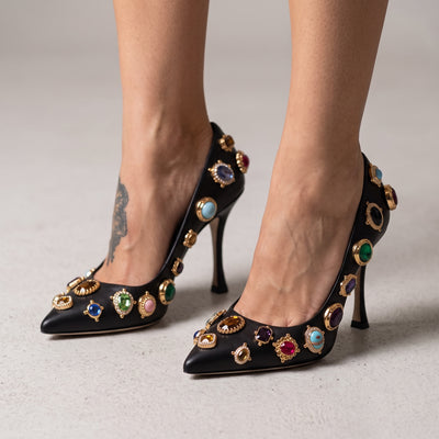 black pointed-toe pumps with multicolour jewel embellishments and gold settings