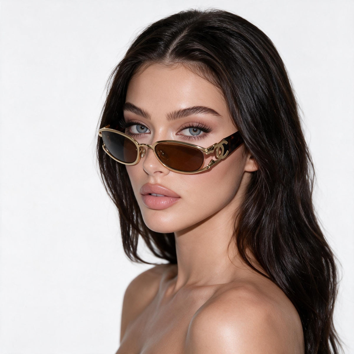 Chanel tortoise sunglasses with gold CC logo and brown lenses