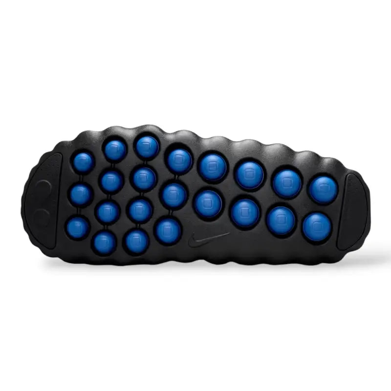 Black Nike Mind slip-on clog with blue circular pods on the sole