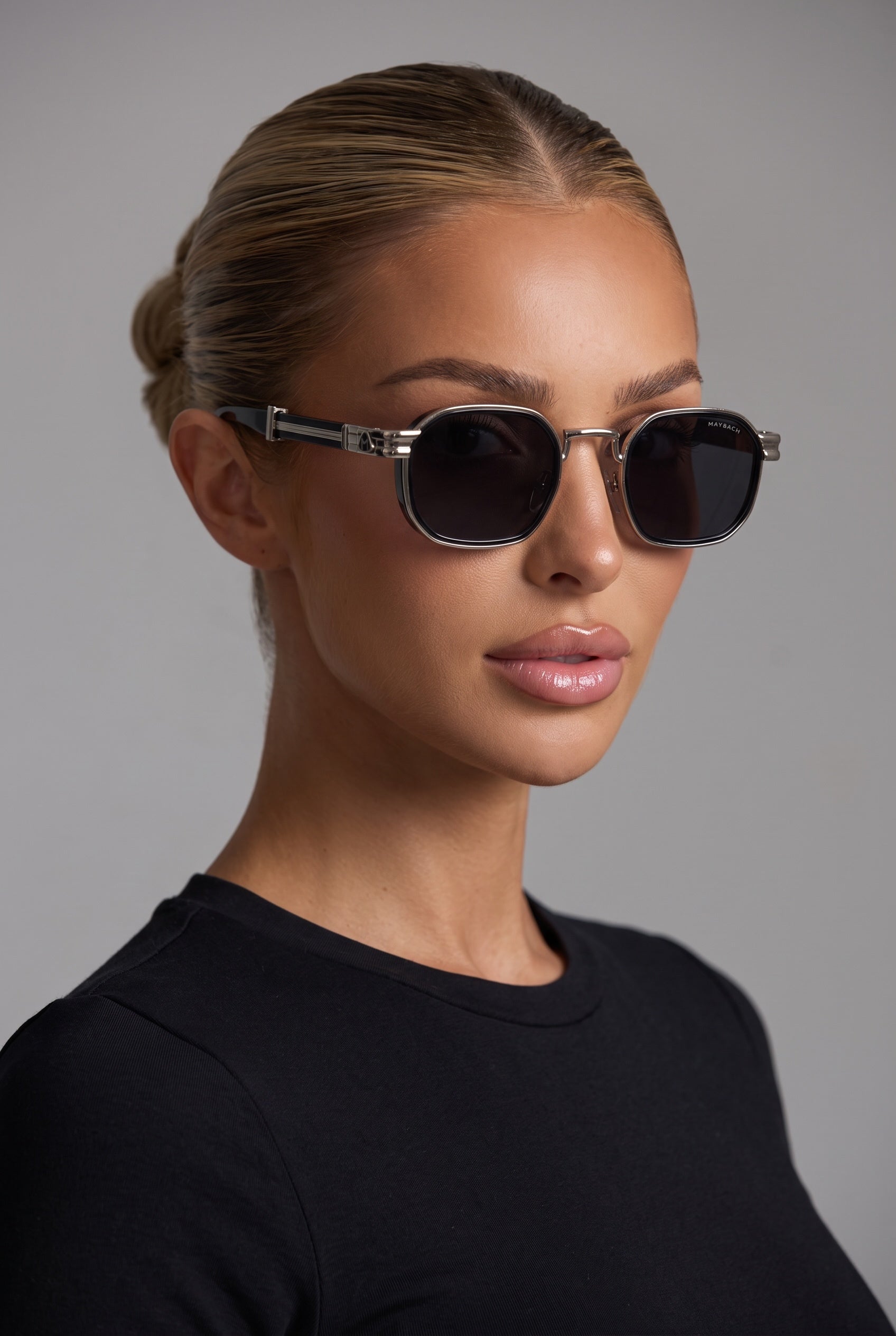 Maybach silver-accent sunglasses with dark rounded-square lenses