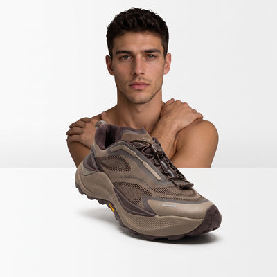 adidas brown trail sneaker with chunky lug sole and quick-lace toggle