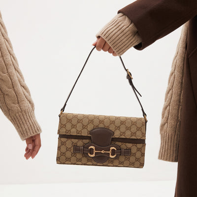 Gucci Horsebit 1955 beige GG monogram shoulder bag with brown leather trim and gold horsebit hardware
