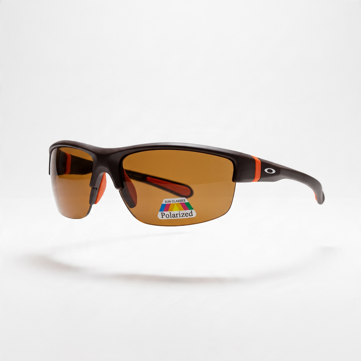 Oakley brown wrap sunglasses with orange accents and polarized lenses.