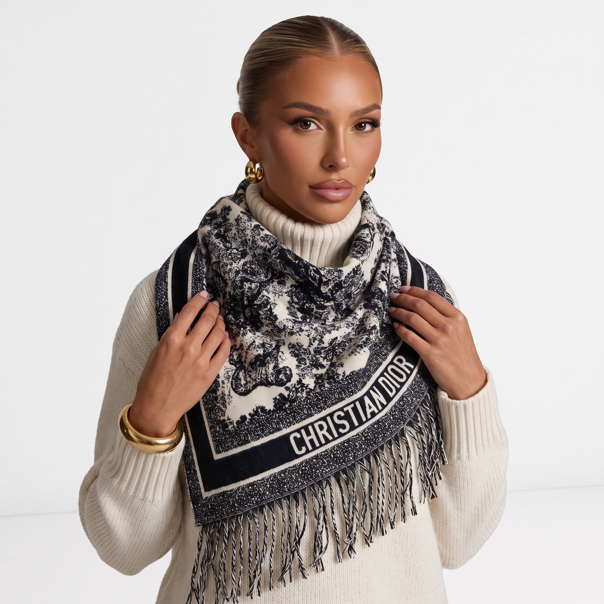 Black and ivory Christian Dior shawl with logo band and fringed edges