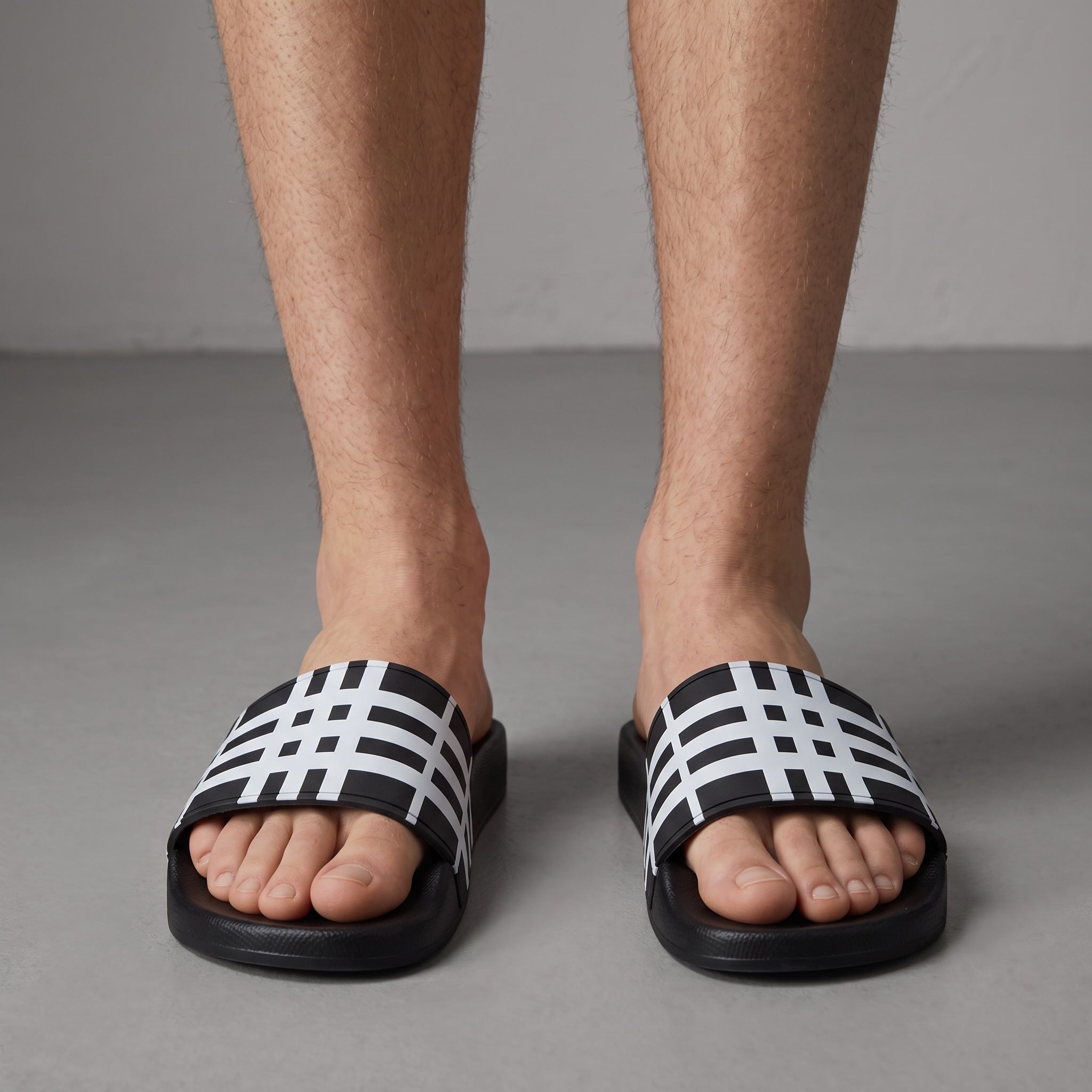 Burberry black and white check slide sandal on foot
