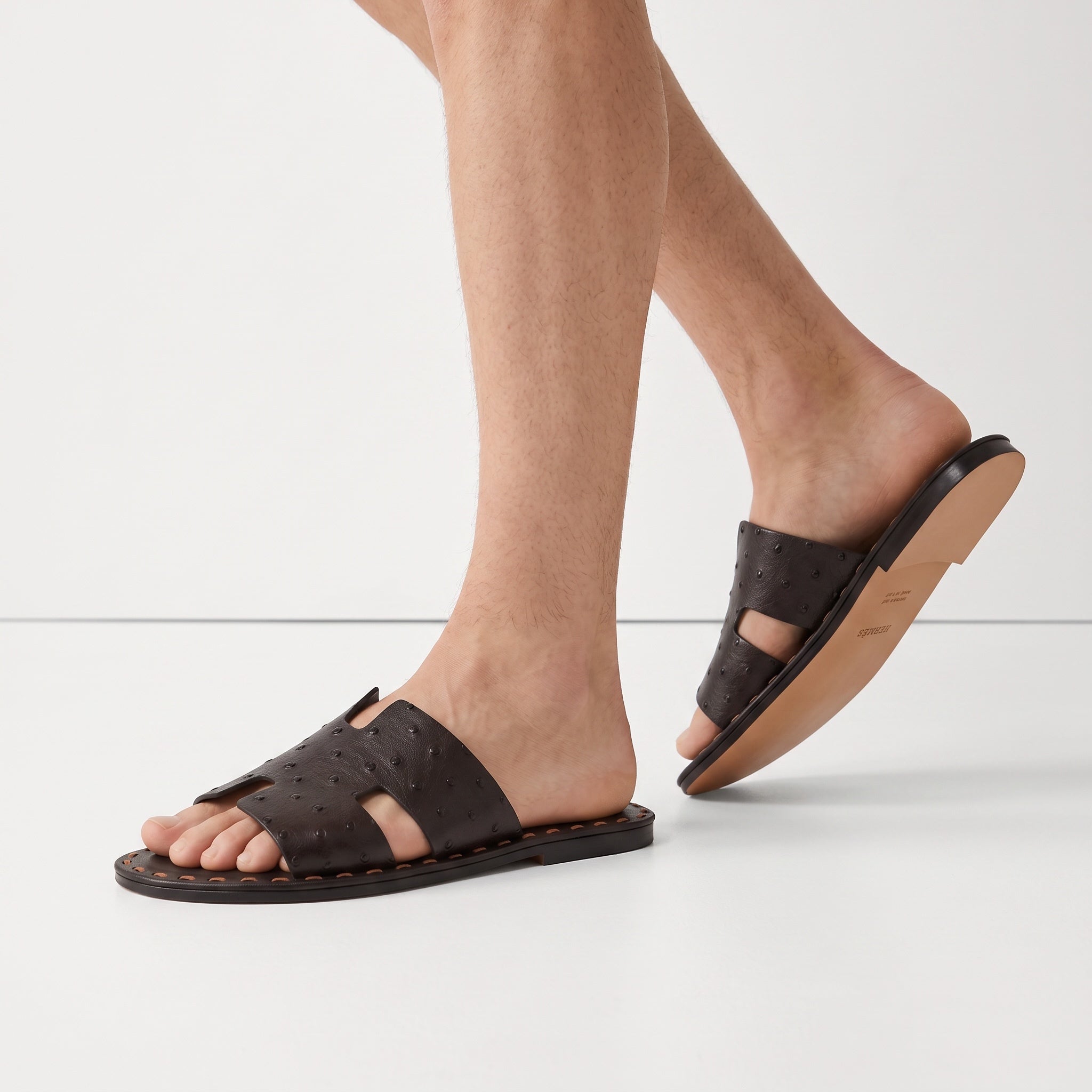 Hermès dark brown studded leather slide sandal with leather sole