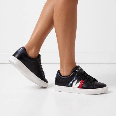 Moncler black low-top sneakers with blue white red stripes and white platform sole