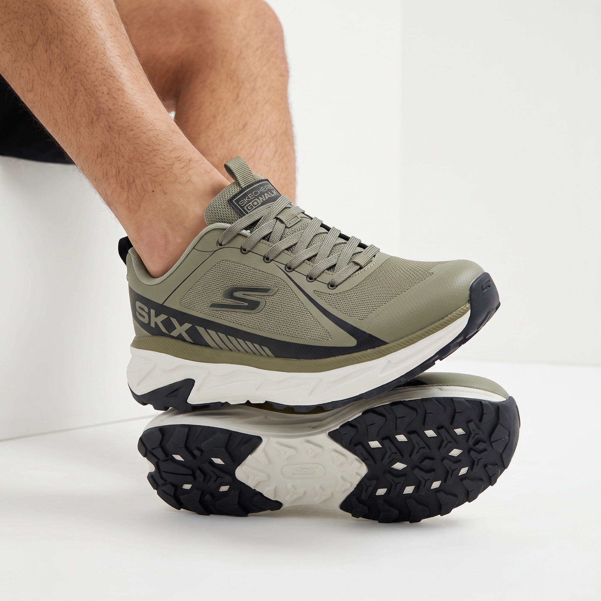 Skechers GoWalk olive green men's trainer with mesh upper and chunky sole
