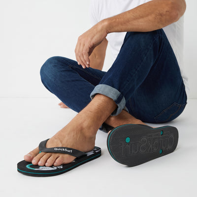 QuickSurf black and teal flip flops with graphic footbed and textured strap