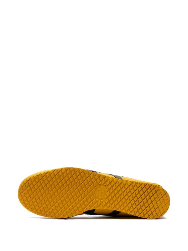 Yellow Onitsuka Tiger Mexico 66 sneaker with black stripes side view