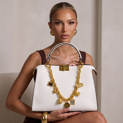 White Fendi top-handle shoulder bag with gold chain charms and logo strap