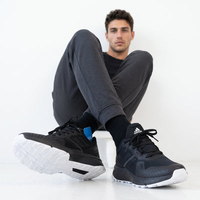 Adidas Terrex black trail running sneaker with white outsole