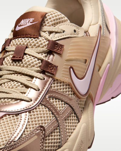 Nike tan and pink chunky sneaker with mesh upper and metallic overlays