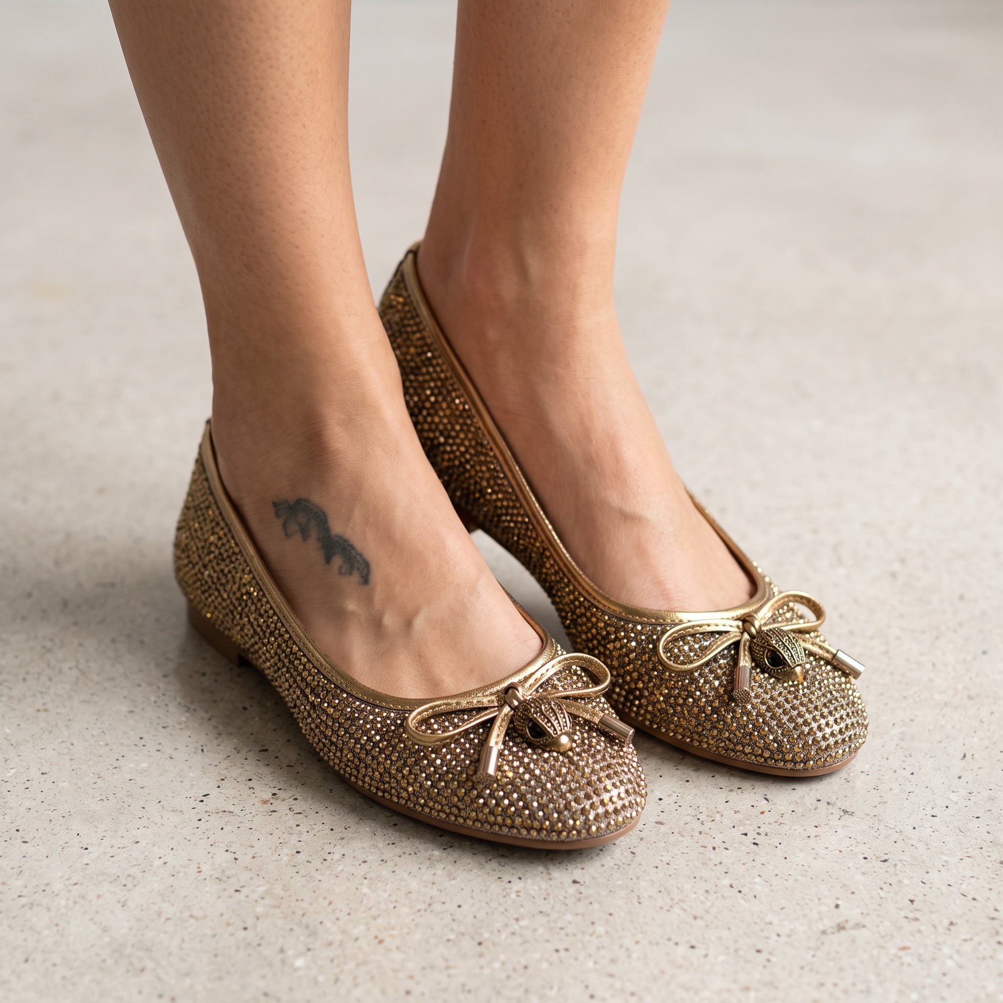 metallic gold crystal embellished ballet flats with bow
