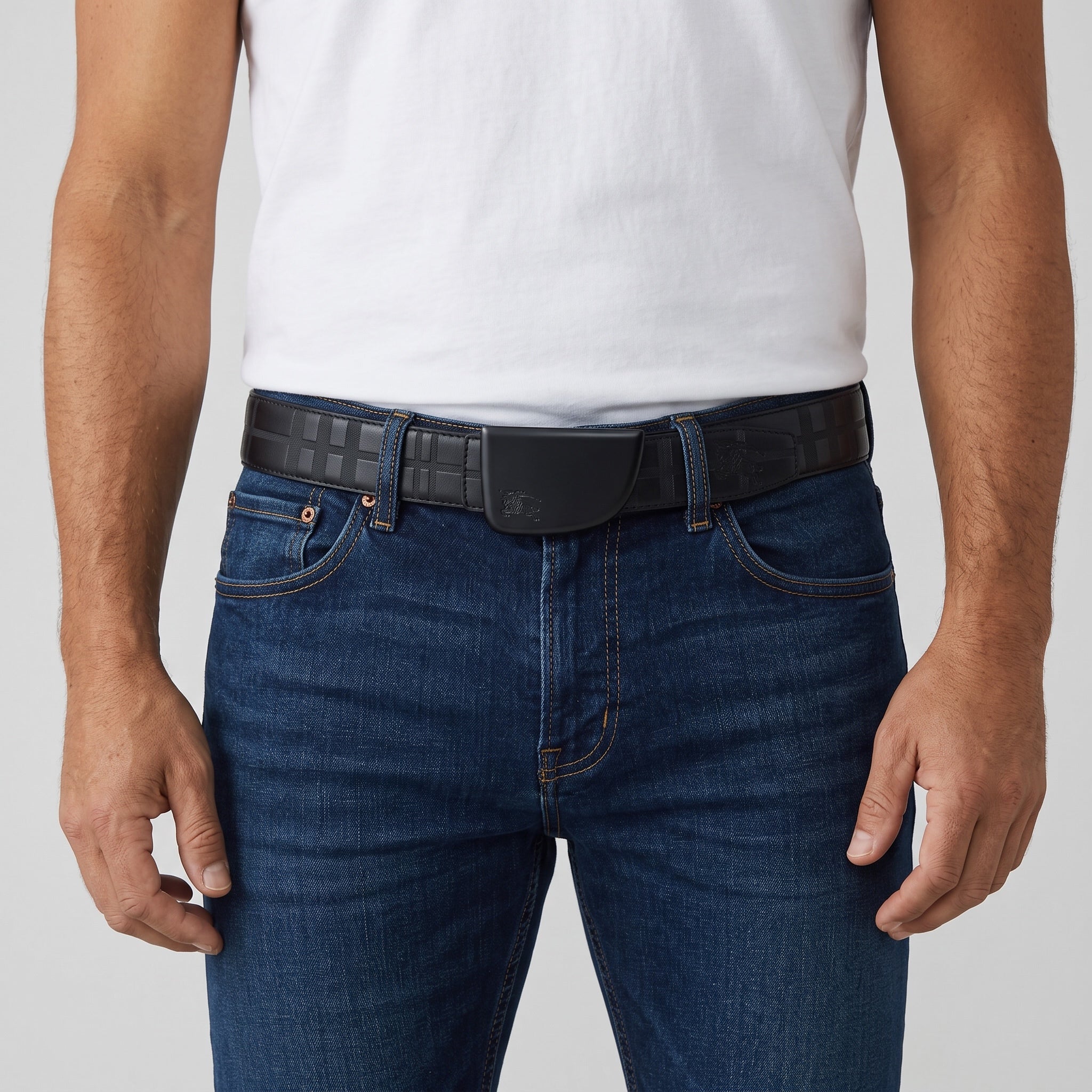 Black Burberry belt with matte plaque buckle worn with jeans