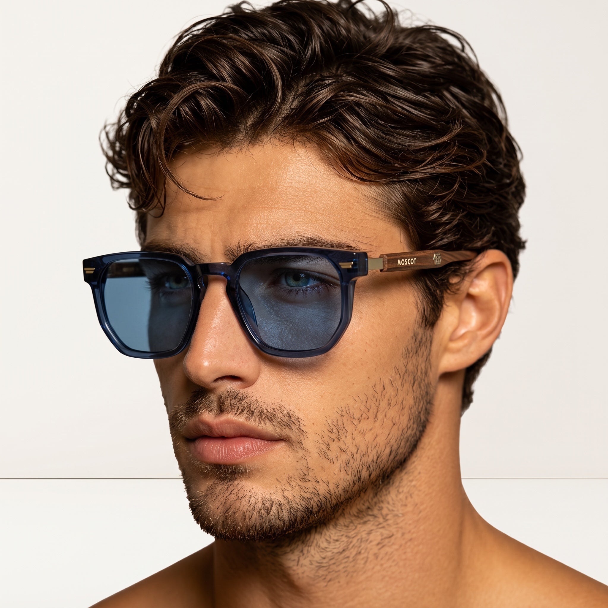 Close-up of Moscot navy blue square sunglasses with wood-effect temples