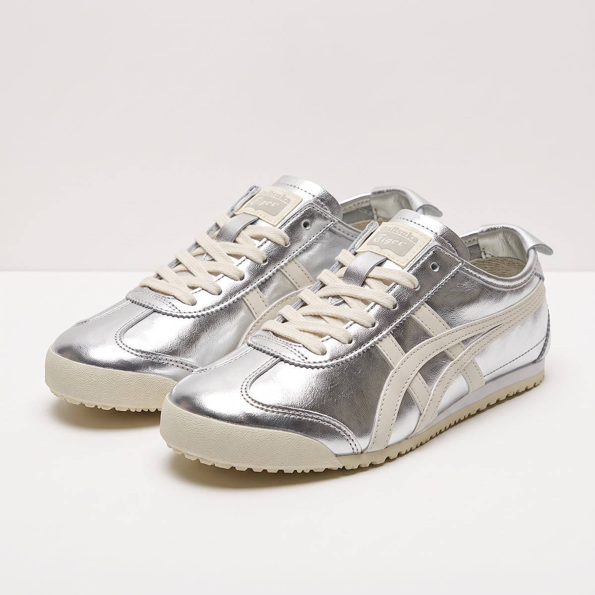 silver Onitsuka Tiger Mexico 66 sneakers with cream stripes and gum sole