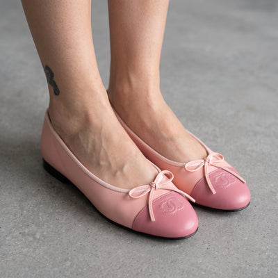 pink Chanel cap-toe ballerina flats with stitched CC logo