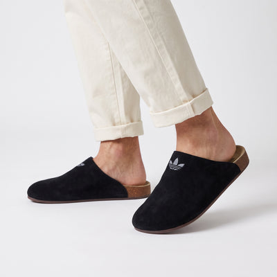 Adidas black slip-on mule with Trefoil logo and cork footbed