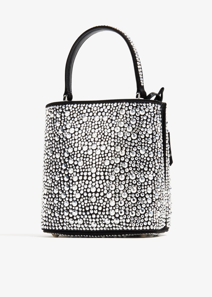 Prada black bucket bag covered in crystals with top handle and shoulder strap