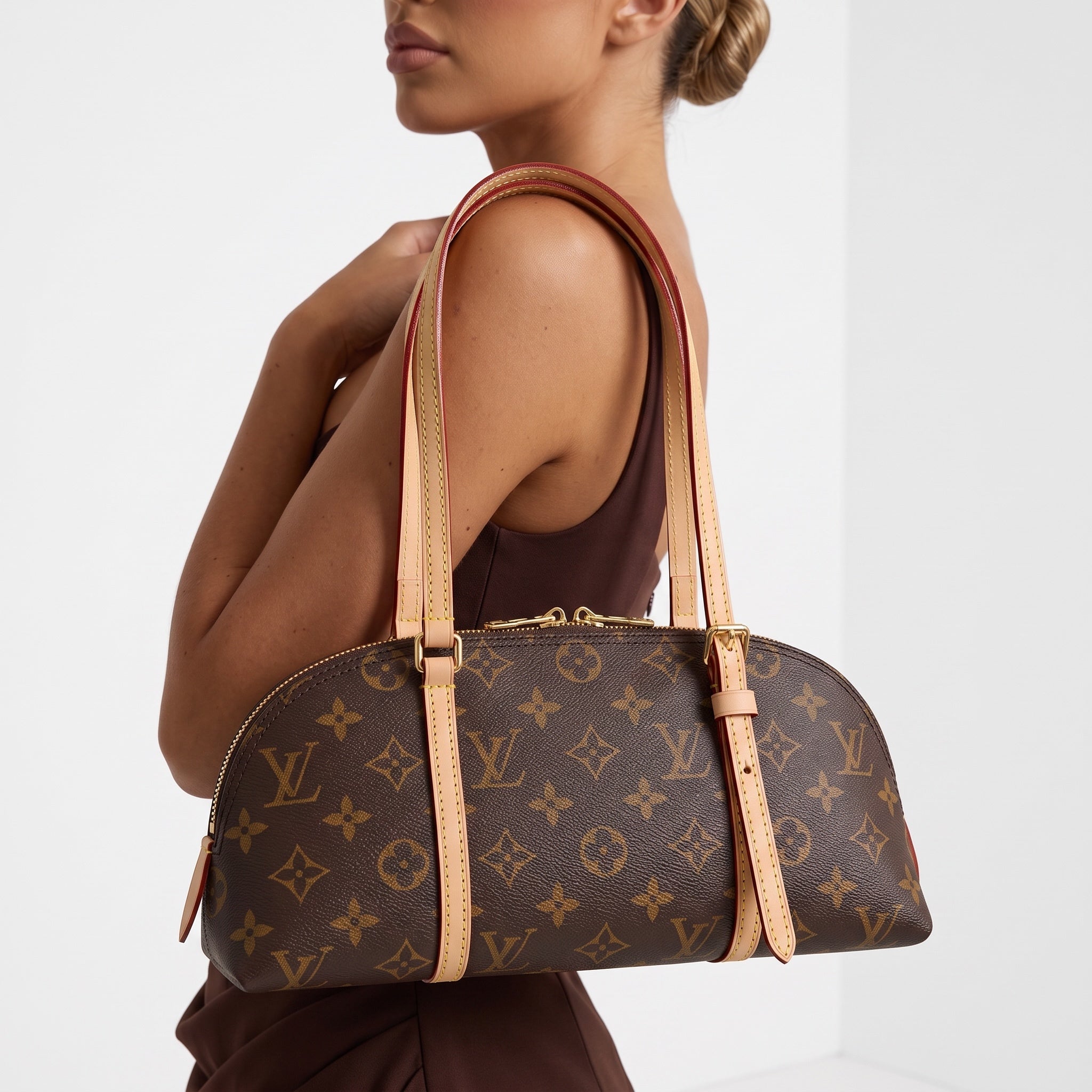 Louis Vuitton monogram dome satchel with long natural trim handles and gold hardware